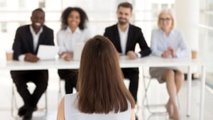 A group of people in a job interview recruiting for a new employee.